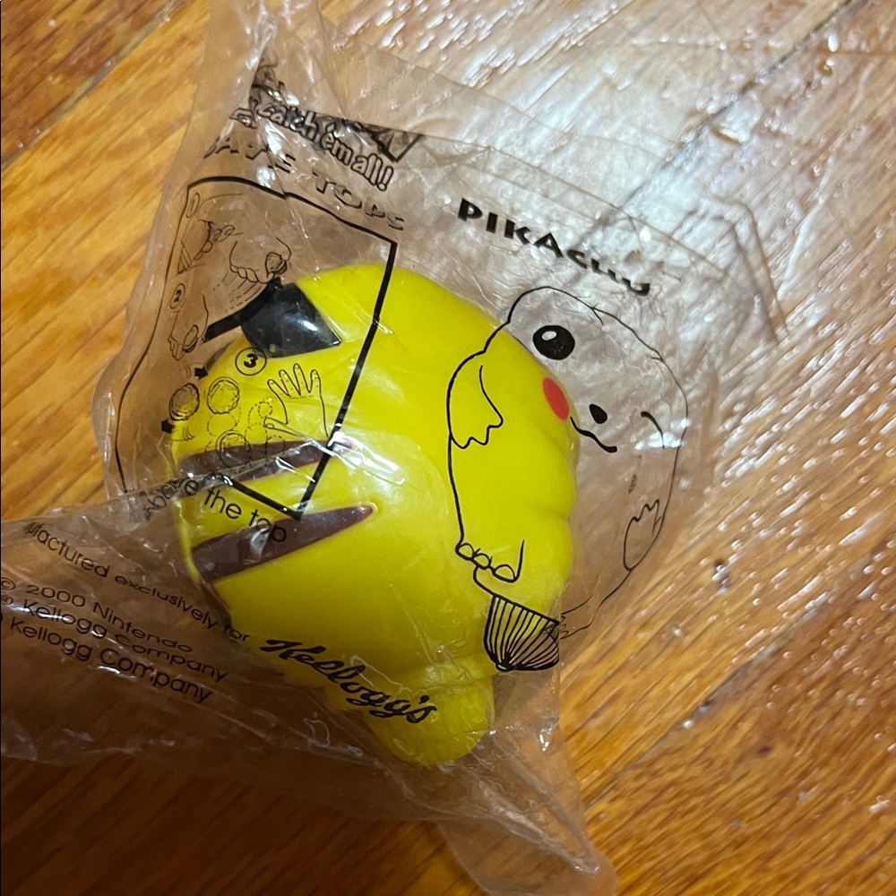 KELLOGGS Pikachu Battle Top 2000